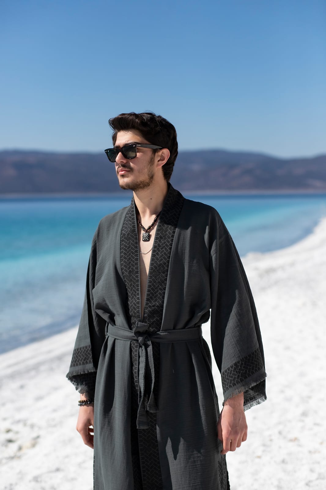 Men’s luxury loungewear kimono crafted from premium linen and hemp blend. Designed for resort wear, beach cover-ups, and sophisticated relaxation